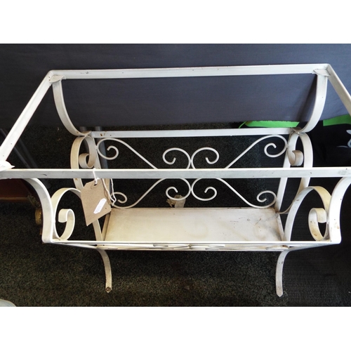 658 - A white painted magazine rack