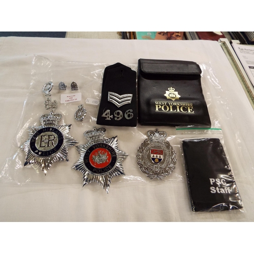 152 - A mixed selection of Police badges and insignia