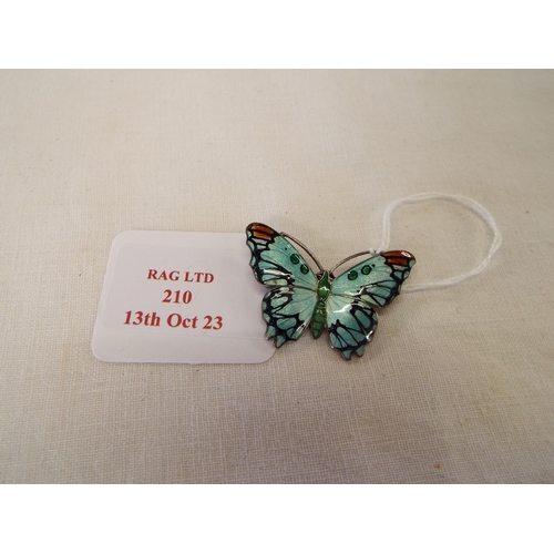 210 - A sterling silver and enamel blue butterfly brooch