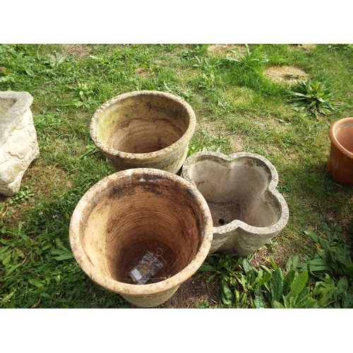 247 - Two terracotta pots and a concrete garden planter