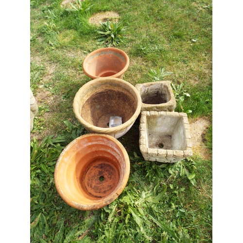 248 - Three terracotta garden pots and two small concrete pots