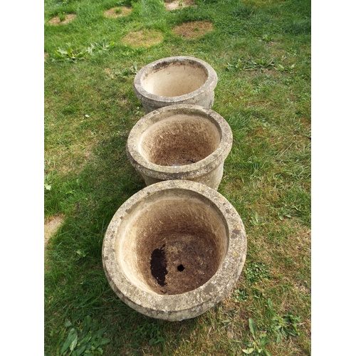 249 - Three concrete garden pots with floral decoration