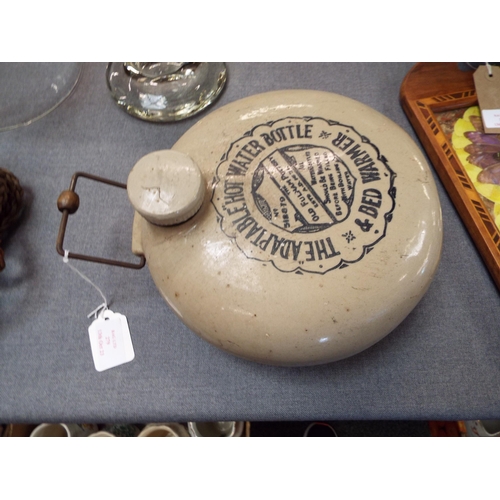 279 - A stone-ware hot water bottle with printed makers name 'The Old Fulham Pottery'