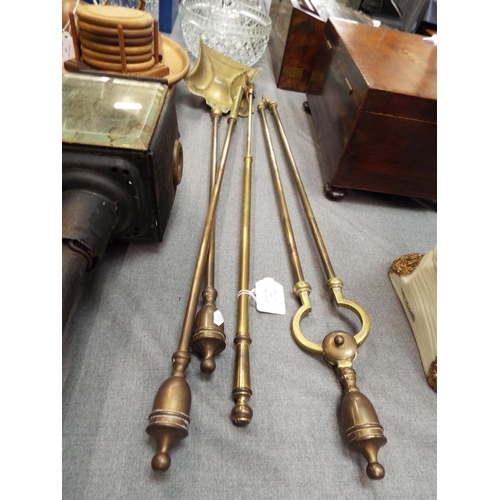 288 - A selection of assorted brass fireside tools