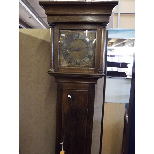 299 - An oak cased Victorian Grandfather clock the brass dial having Roman numerals for Richard Briggs Rum... 