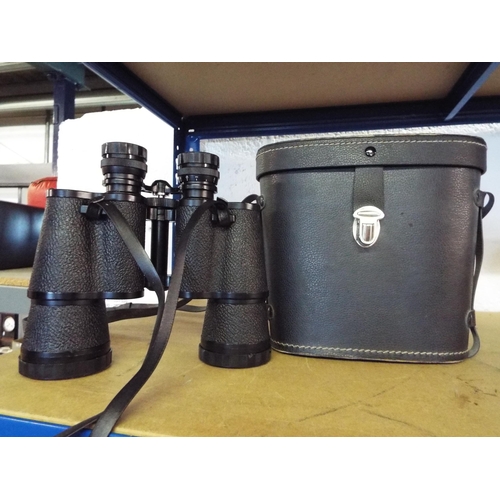 325 - A pair of Commodore 10 x 50 field 5:5 binoculars in leather carry case