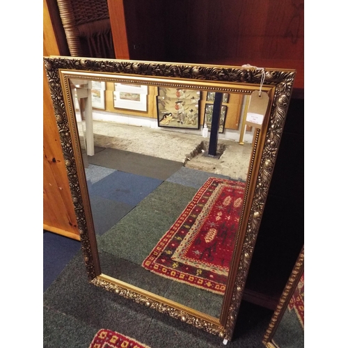 398 - A gilt framed bevel glass mirror