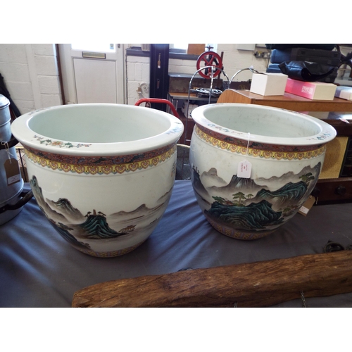 480 - A pair of Chinese famille rose large fish bowls with pictorial landscape scene and verse 16 1/2