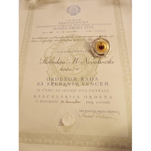 136 - A Yugoslavian solid silver award and citation