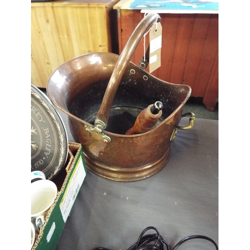 474 - A vintage copper hand beaten coal scuttle and shovel