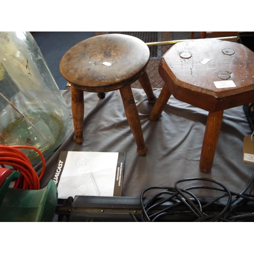 483 - Two antique milking stools