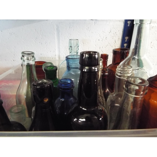 287 - A mixed selection of vintage glass bottles