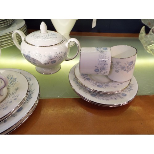 65A - A Wedgwood bone china 'Belle Fleur' coffee/dinner service (one cup missing)