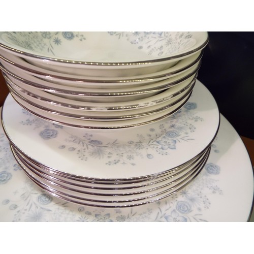 65A - A Wedgwood bone china 'Belle Fleur' coffee/dinner service (one cup missing)