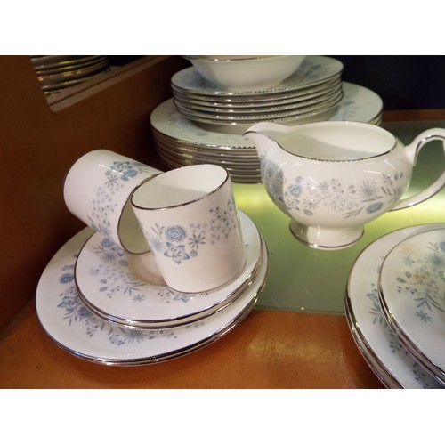 65A - A Wedgwood bone china 'Belle Fleur' coffee/dinner service (one cup missing)