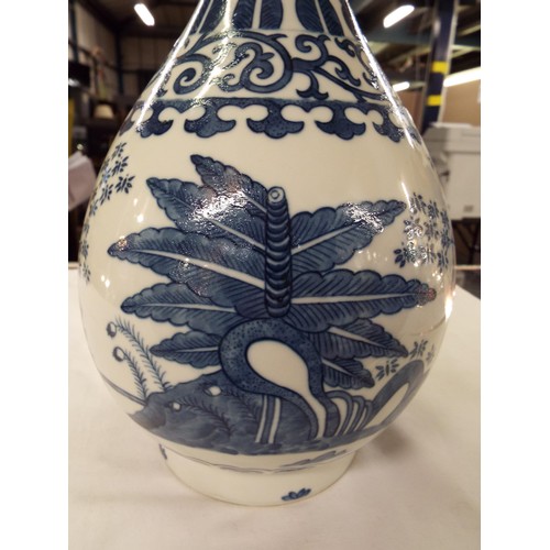 A Chinese Ching blue and white display stand with floral decoration ...