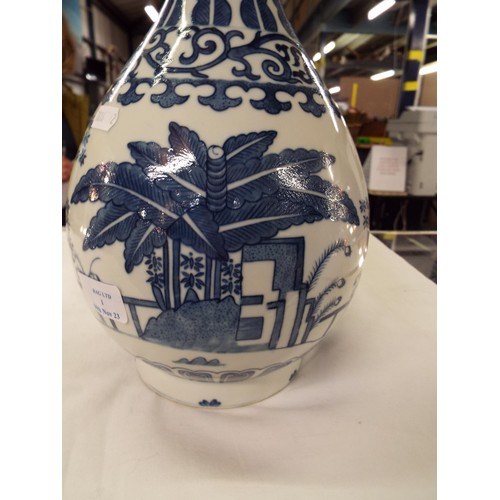 A Chinese Ching blue and white display stand with floral decoration ...