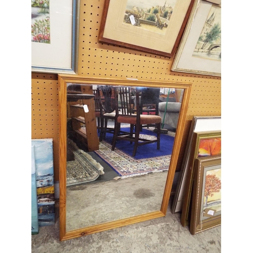 398 - A pine framed mirror