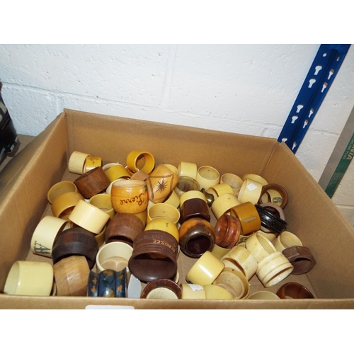 375 - A large selection of bone, wooden and horn napkin rings