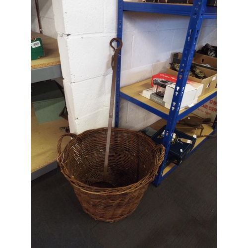 389 - A log basket together with a chestnut roaster shovel