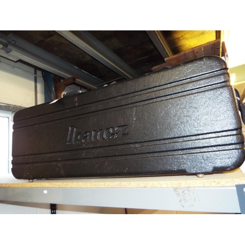 390 - An Ibanez hard carry case for a guitar