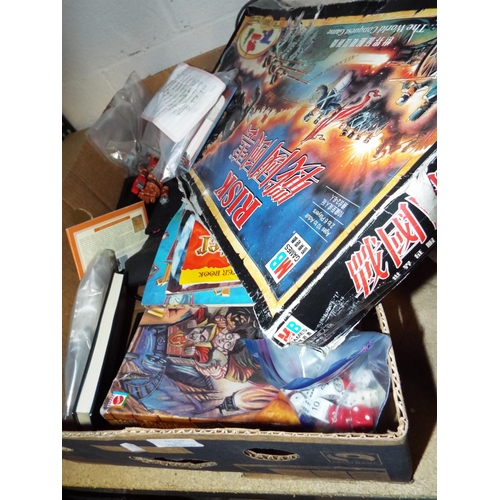 393 - A box of assorted games, puzzles, Harry Potter collector's cards etc