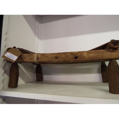 415 - An antique wooden Asian headrest