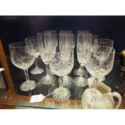 138 - A set of eight crystal wine glasses and a set of six crystal flutes