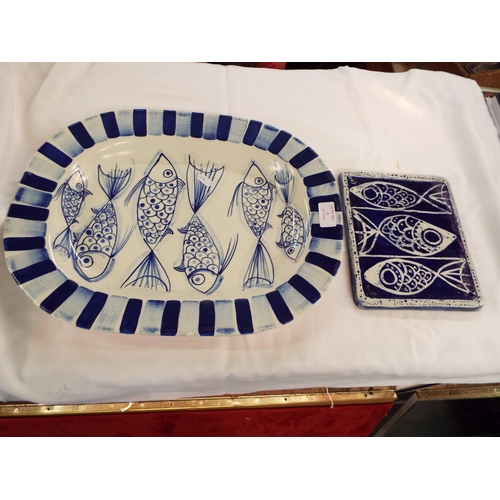 20 - A Dennis Townsend of Rye blue and white platter with fish decoration and a tile, small chip to side