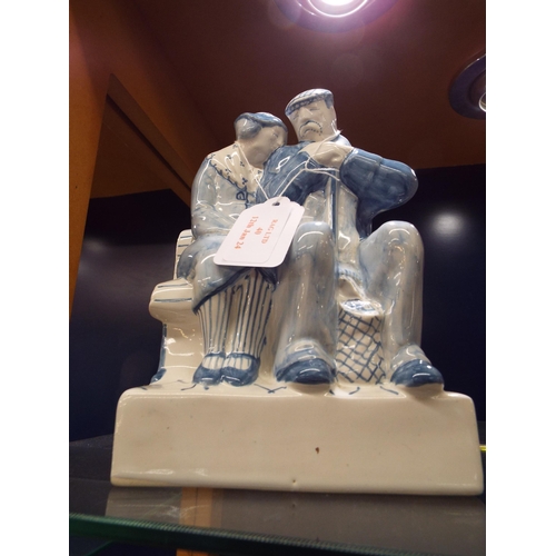 40 - A Rye Pottery blue glazed figurine 'Lovers'
