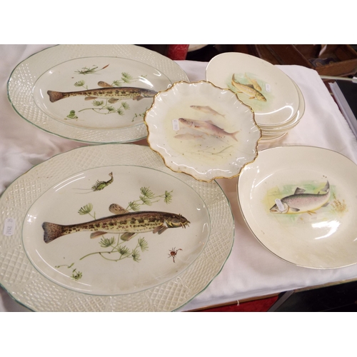 58 - A mixed selection of assorted plates decorated with fish to include Wedgwood and Marlborough example... 