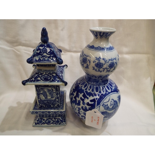 9 - A Quing blue and white double gourd vase seal mark to base and a blue and white temple vase with lid... 