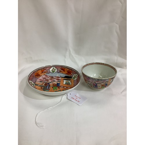 33 - An early porcelain tea bowl and saucer having Oriental village scene decoration