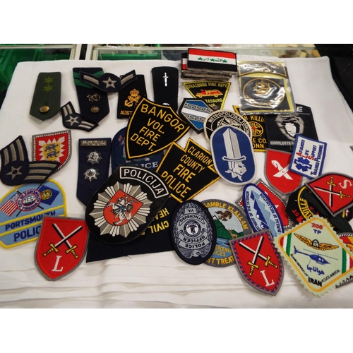 146 - A mixed selection of cloth insignia mainly USA