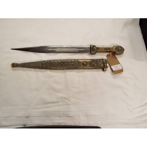 153 - A Khanjali dagger with having ornately decorated metal scabbard