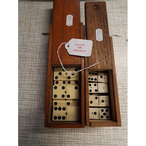 160 - Two boxes of dominoes (one piece missing from larger set)