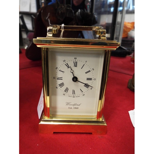 176 - A Woodford brass carriage clock in working order