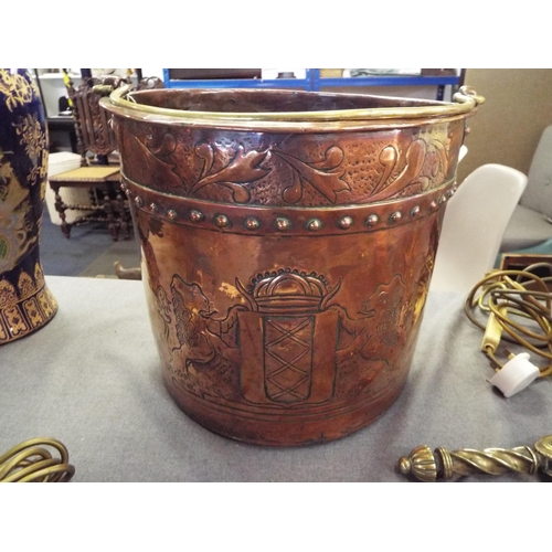 363 - A Victorian copper bucket decorated with a Coat of Arms and a milking scene