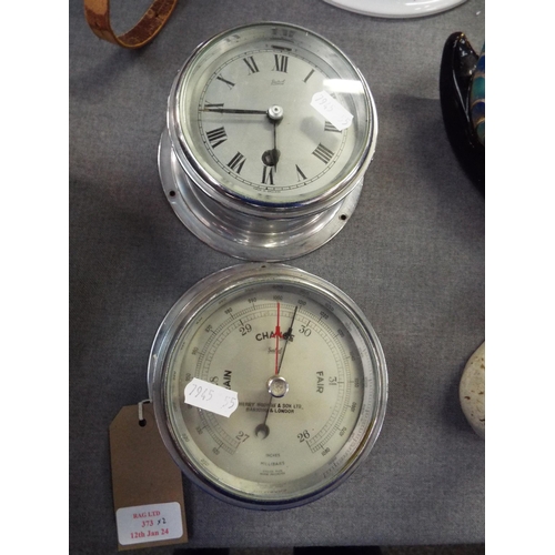 A pair of Sestrel brushed steel ships clock and barometer