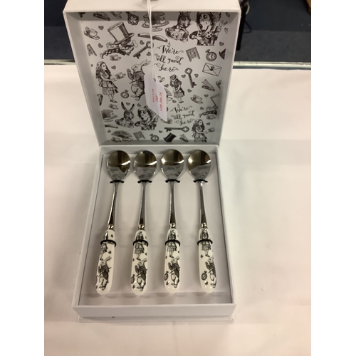 203 - A box set of V&A 'Alice In Wonderland' porcelain handled tea-spoons