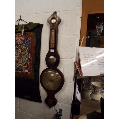 419 - A rosewood onion top barometer by Masters of Tenterden