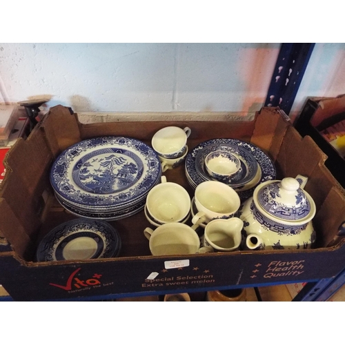 434 - A mixed selection of blue and white table-ware to include plates, cups, tea-pot etc