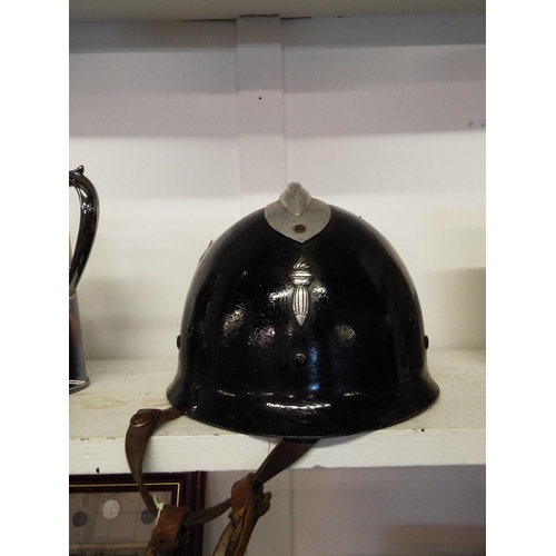 455 - A vintage French police/fireman's helmet