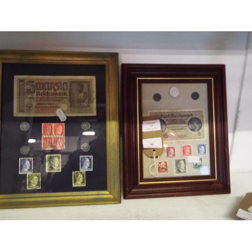 459 - Two framed and glazed German bank notes, coins and stamps