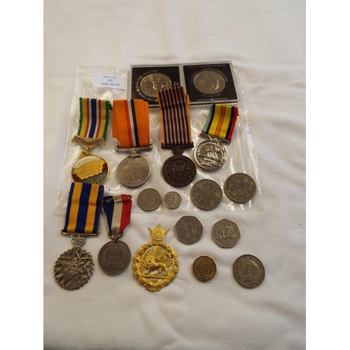 115 - A mixed selection of assorted medals and coinage to include the Nation Service Medal 1947-1997, 50th... 