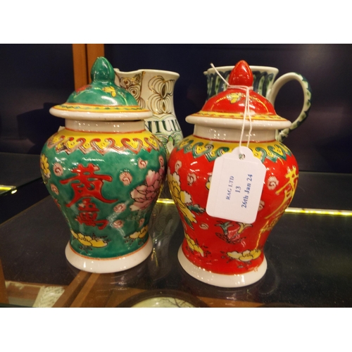 13 - A pair of Chinese ginger jars with floral decoration red seal marks to base 6 1/2