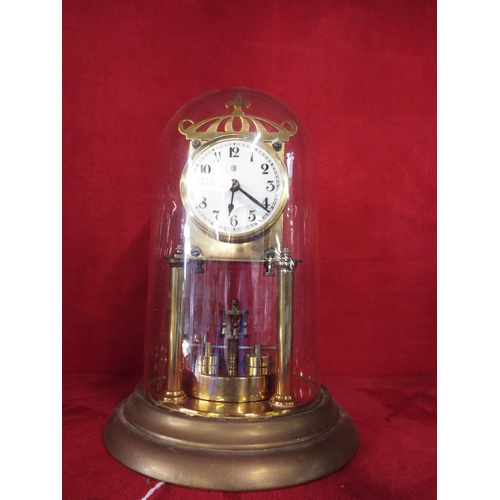 308 - A brass and glass torsion clock for restoration