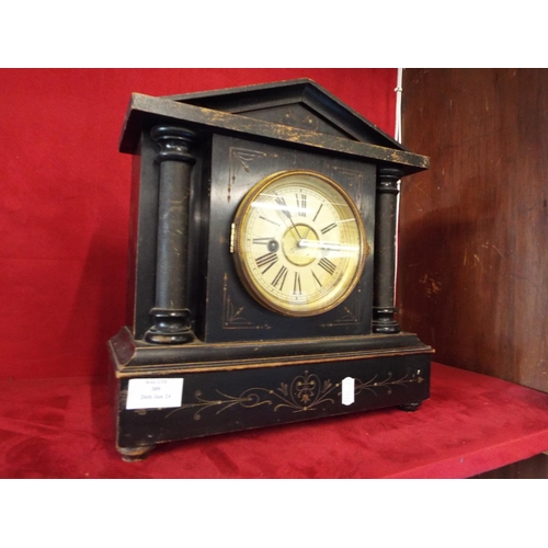 309 - A stained wood mantel clock