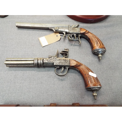 345 - Two replica vintage pistols