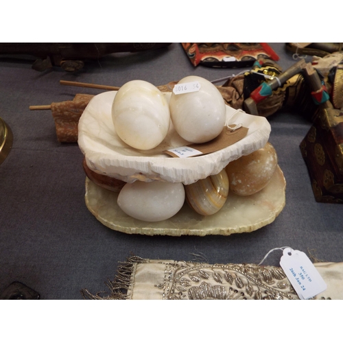 349 - A selection of alabaster eggs and two dishes